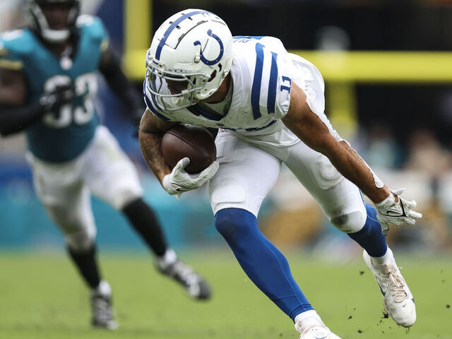 JACKSONVILLE, FLORIDA - OCTOBER 06: Michael Pittman Jr. #11 of the Indianapolis Colts runs with the ball during an NFL football game against the Jacksonville Jaguars at EverBank Stadium on October 6, 2024 in Jacksonville, Florida.