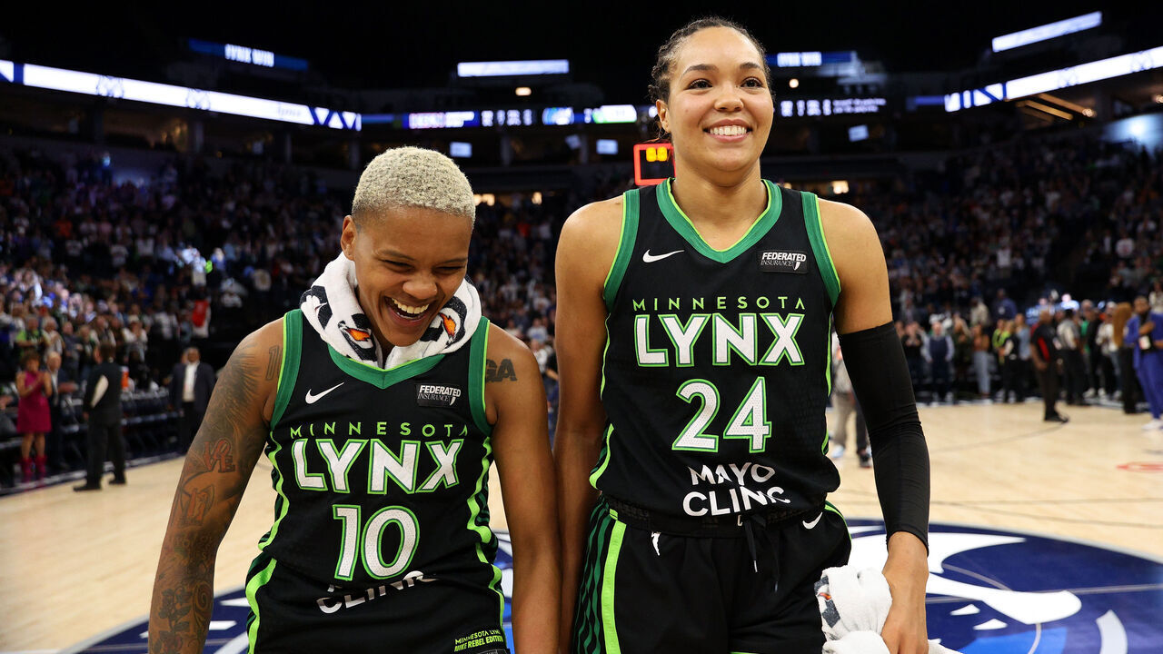 MINNEAPOLIS, MINNESOTA - OCTOBER 08: Courtney Williams #10 and Napheesa Collier #24 of the Minnesota Lynx celebrate their victory against the Connecticut Sun after Game Five of the Semi-Finals during the WNBA Playoffs at Target Center on October 08, 2024 in Minneapolis, Minnesota. The Lynx defeated the Sun 88-77.
