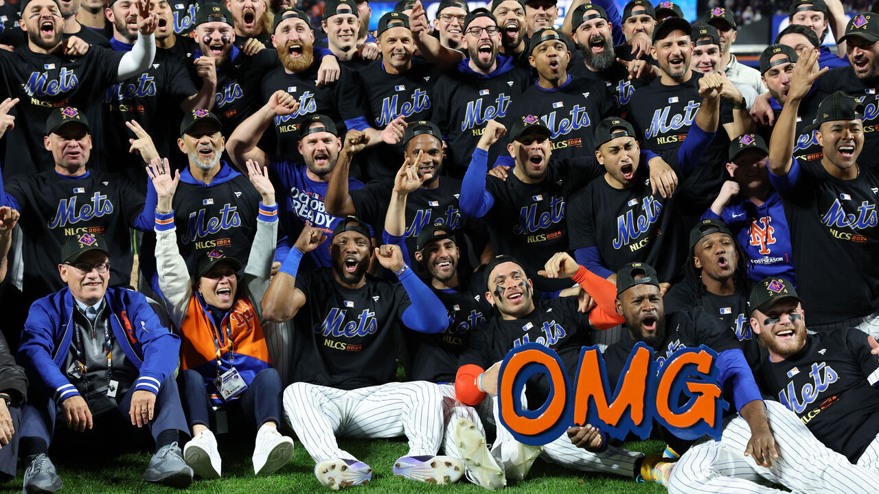 NEW YORK, NEW YORK - OCTOBER 09: The New York Mets pose for pictures after beating the Philadelphia Phillies 4-1 in Game Four of the Division Series at Citi Field on October 09, 2024 in New York City.