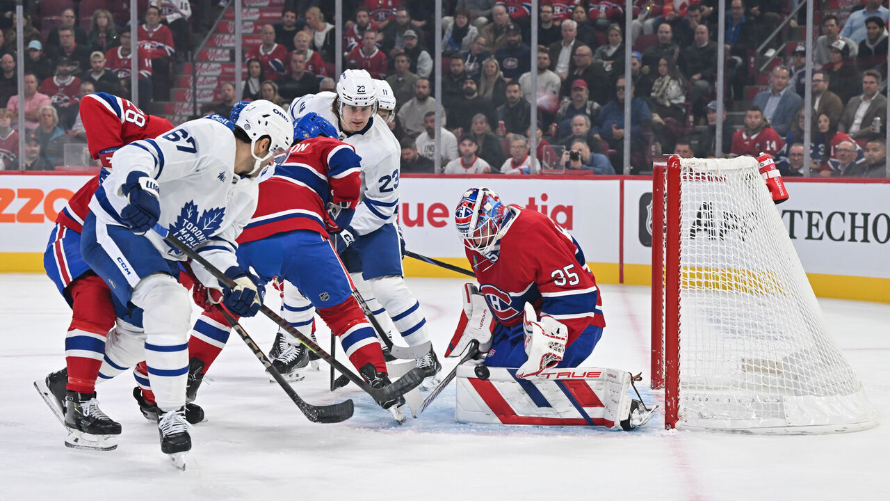 MONTREAL, CANADA - OCTOBER 09: Goaltender Sam Montembeault #35 of the Montreal Canadiens makes a pad save during the first period against the Toronto Maple Leafs at the Bell Centre on October 9, 2024 in Montreal, Quebec, Canada.