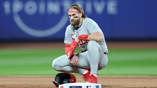 NEW YORK, NEW YORK - OCTOBER 09: Bryce Harper #3 of the Philadelphia Phillies looks on from second base in the sixth inning against the New York Mets during Game Four of the Division Series at Citi Field on October 09, 2024 in New York City.