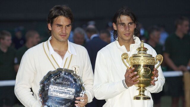 Tennis: Wimbledon: Spain Rafael Nadal victorious with Gentlemen's Singles Trophy and Switzerland Roger Federer with runner-up trophy after Finals match at All England Club. London, England 7/6/2008 CREDIT: Bob Martin