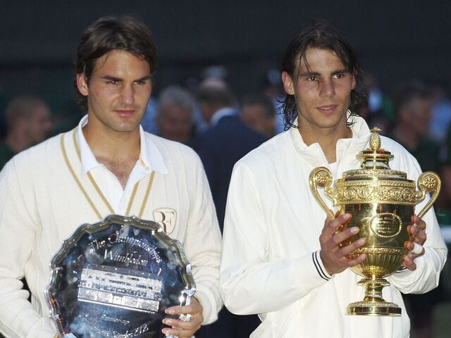 Tennis: Wimbledon: Spain Rafael Nadal victorious with Gentlemen's Singles Trophy and Switzerland Roger Federer with runner-up trophy after Finals match at All England Club. London, England 7/6/2008 CREDIT: Bob Martin