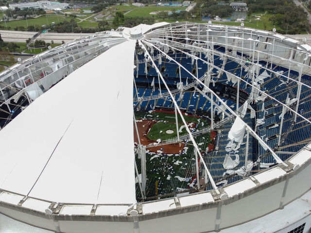 A drone image shows the dome of Tropicana Field which has been torn open due to Hurricane Milton in St. Petersburg, Florida, on October 10, 2024. At least four people were confirmed killed as a result of two tornadoes triggered by Hurricane Milton on the east coast of the US state of Florida, local authorities said Thursday.