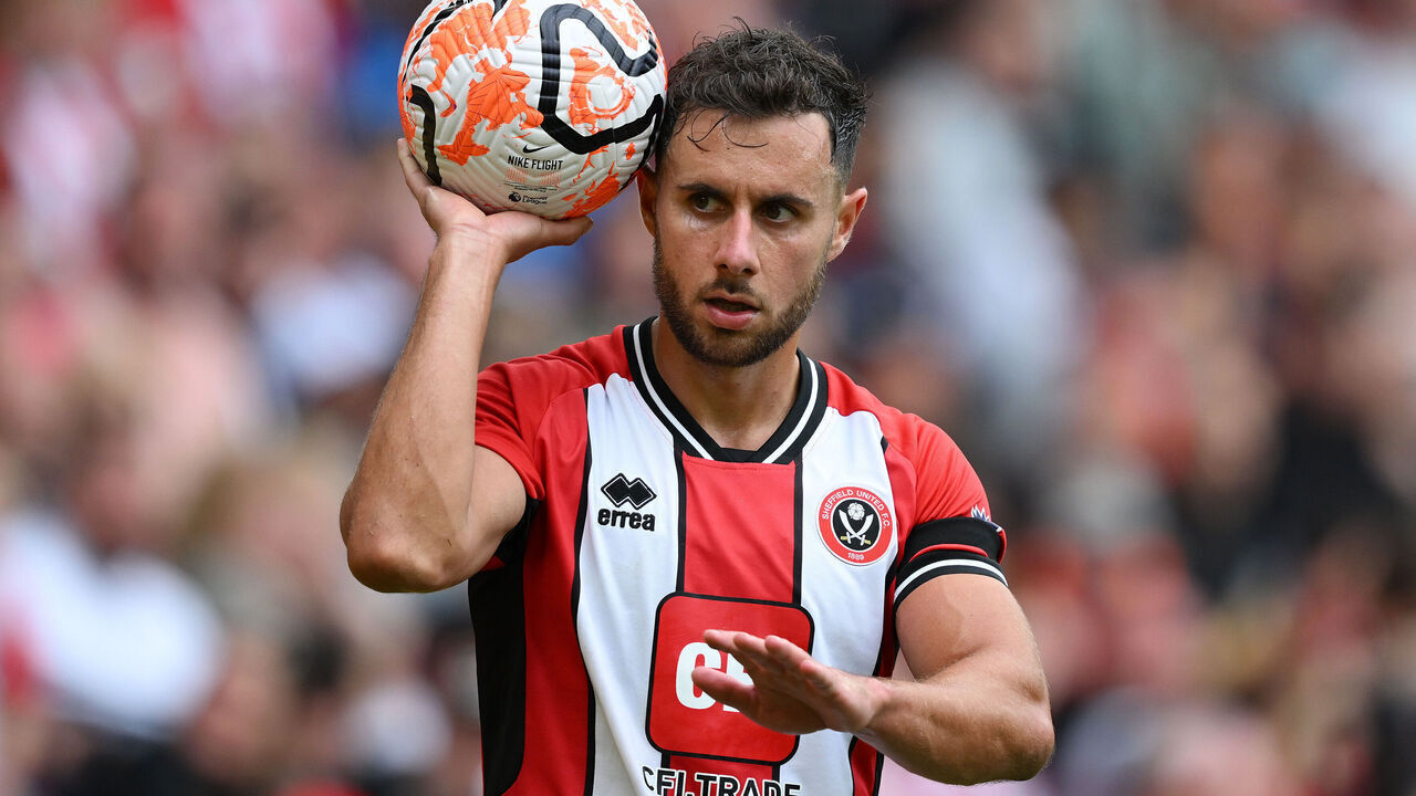 SHEFFIELD, ENGLAND - AUGUST 12: George Baldock of Sheffield United prepares to take a throw-in during the Premier League match between Sheffield United and Crystal Palace at Bramall Lane on August 12, 2023 in Sheffield, England.