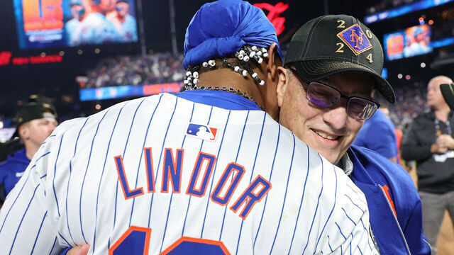 NEW YORK, NEW YORK - OCTOBER 09: Francisco Lindor #12 and owner Steve Cohen of the New York Mets celebrate after beating the Philadelphia Phillies 4-1 in Game Four of the Division Series at Citi Field on October 09, 2024 in New York City.