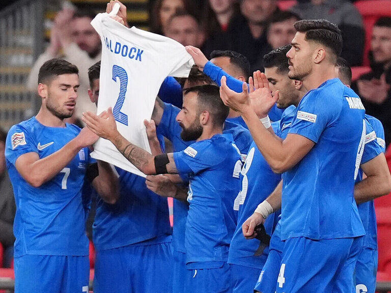 Greek players pay tribute to Baldock during historic upset win over England Greek players pay tribute to Baldock during historic upset win over England
