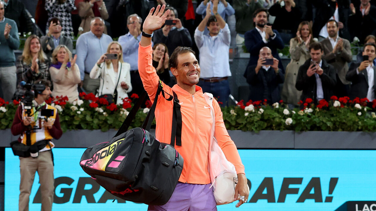 MADRID, SPAIN - APRIL 30: Rafael Nadal of Spain waves goodbye to the Spanish fans after defeat in his last professional match in Spain against Jiri Lehecka of the Czech Republic during their Men's Round of 16 match on day eight of the Mutua Madrid Open at La Caja Magica on April 30, 2024 in Madrid, Spain.