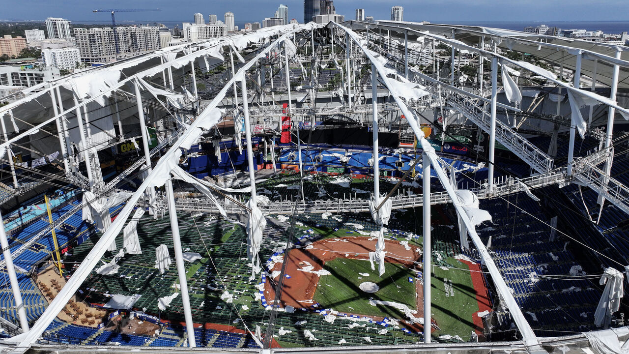ST PETERSBURG - OCTOBER 10: In this aerial view, the roof of Tropicana Field is seen in tatters after Hurricane Milton destroyed it as the storm passed through the area on October 10, 2024, in St. Petersburg, Florida. The storm made landfall as a Category 3 hurricane in the Siesta Key area of Florida, causing damage and flooding throughout Central Florida.