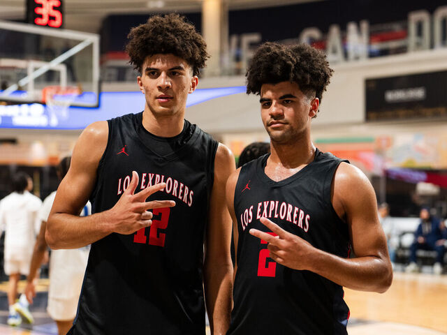 EAST RUTHERFORD, NJ - MARCH 27: Cayden Boozer #2 and Cameron Boozer #12 of the Columbus Explorers pose for picture after the game against the Notre Dame Knights during The Throne high school basketball tournament on March 27, 2024 at American Dream in East Rutherford, New Jersey. NOTE TO USER: User expressly acknowledges and agrees that, by downloading and/or using this photograph, user is consenting to the terms and conditions of the Getty Images License Agreement. Mandatory Copyright Notice: Copyright 2024 NBAE