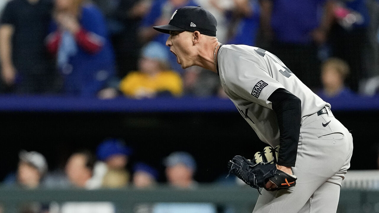 KANSAS CITY, MISSOURI - OCTOBER 10: Luke Weaver #30 of the New York Yankees celebrates after a win over the Kansas City Royals during Game Four of the Division Series at Kauffman Stadium on October 10, 2024 in Kansas City, Missouri.
