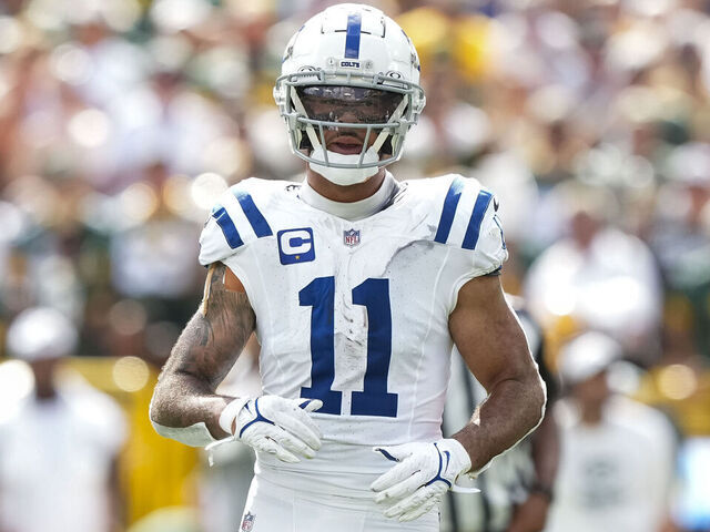 GREEN BAY, WI - SEPTEMBER 15: Wide receiver Michael Pittman Jr. #11 of the Indianapolis Colts gets set during the fourth quarter of an NFL football game against the Green Bay Packers, at Lambeau Field on September 15, 2024 in Green Bay, Wisconsin.