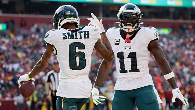LANDOVER, MARYLAND - OCTOBER 29: DeVonta Smith #6 celebrates a fourth quarter touchdown with A.J. Brown #11 of the Philadelphia Eagles during a game against the Washington Commanders at FedExField on October 29, 2023 in Landover, Maryland.