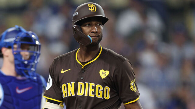 LOS ANGELES, CALIFORNIA - OCTOBER 11: Jurickson Profar #10 of the San Diego Padres reacts after striking out against the Los Angeles Dodgers during the seventh inning of Game Five of the Division Series at Dodger Stadium on October 11, 2024 in Los Angeles, California.