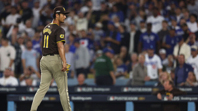 LOS ANGELES, CALIFORNIA - OCTOBER 11: Yu Darvish #11 of the San Diego Padres reacts after being removed from the game against the Los Angeles Dodgers during the seventh inning of Game Five of the Division Series at Dodger Stadium on October 11, 2024 in Los Angeles, California.