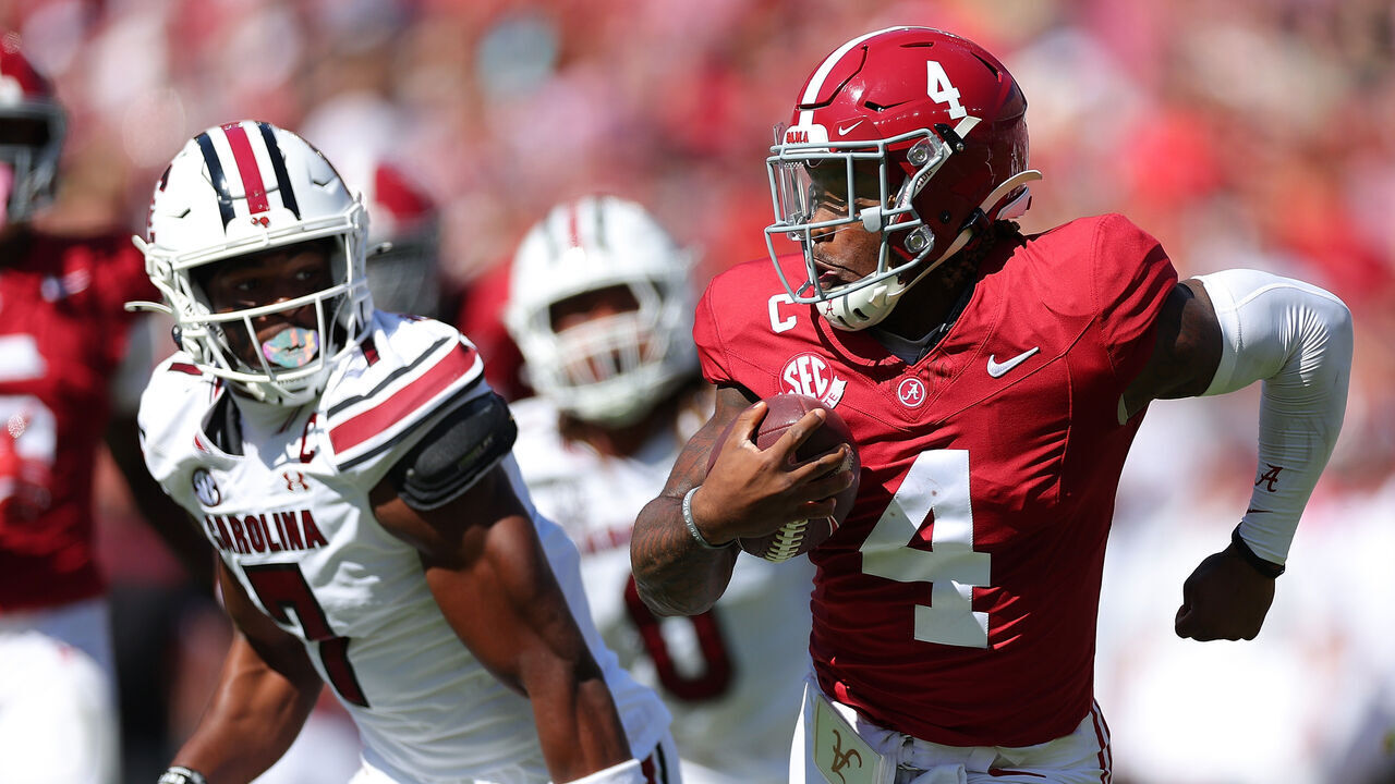 TUSCALOOSA, ALABAMA - OCTOBER 12: Jalen Milroe #4 of the Alabama Crimson Tide rushes away from the South Carolina Gamecocks during the second quarter at Bryant-Denny Stadium on October 12, 2024 in Tuscaloosa, Alabama.