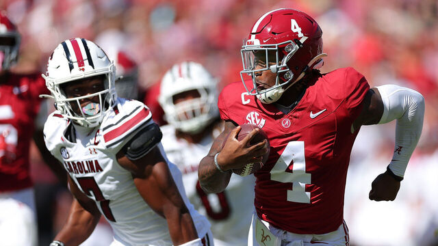 TUSCALOOSA, ALABAMA - OCTOBER 12: Jalen Milroe #4 of the Alabama Crimson Tide rushes away from the South Carolina Gamecocks during the second quarter at Bryant-Denny Stadium on October 12, 2024 in Tuscaloosa, Alabama.