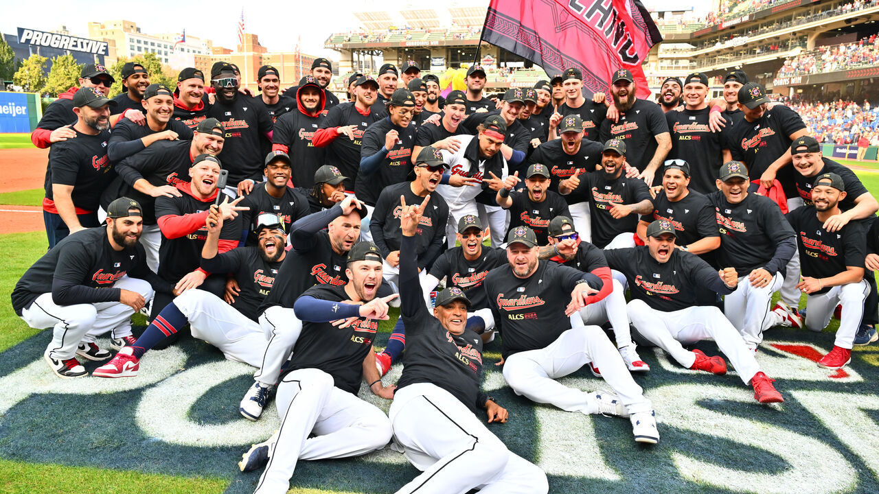 CLEVELAND, OHIO - OCTOBER 12: The Cleveland Guardians pose for a photo after defeating the Detroit Tigers in Game Five of the Division Series at Progressive Field on October 12, 2024 in Cleveland, Ohio.