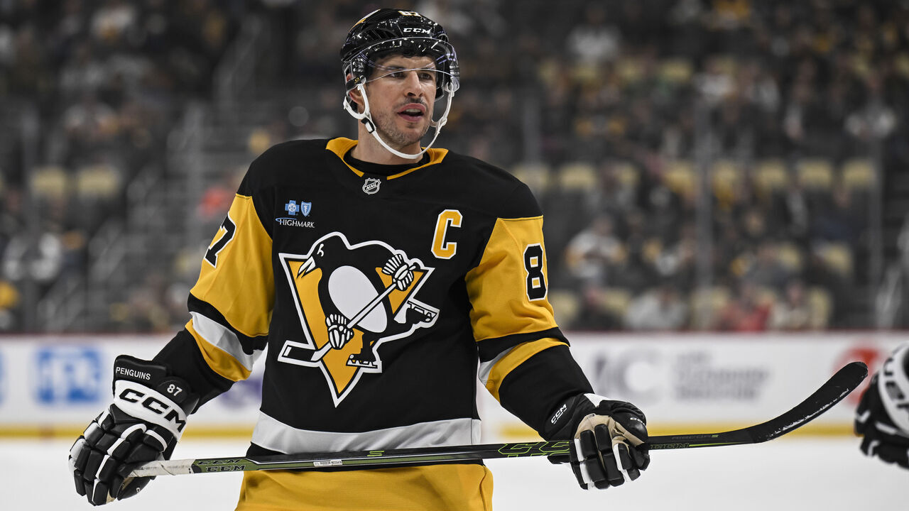 PITTSBURGH, PA - OCTOBER 04: Pittsburgh Penguins center Sidney Crosby (87) looks on during the first period in the NHL preseason game between the Pittsburgh Penguins and the Columbus Blue Jackets on October 4, 2024, at PPG Paints Arena in Pittsburgh, PA.