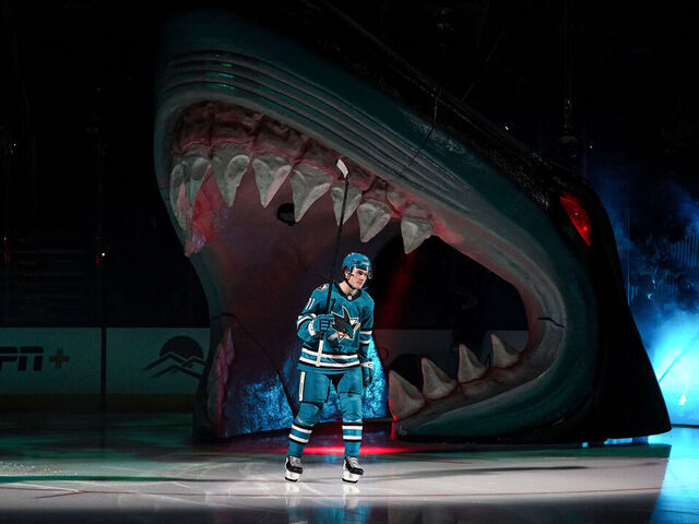 SAN JOSE, CA - OCTOBER 10: Macklin Celebrini #71 of the San Jose Sharks takes the ice through the Shark Head for his NHL Debut against the St. Louis Blues at SAP Center on October 10, 2024 in San Jose, California.