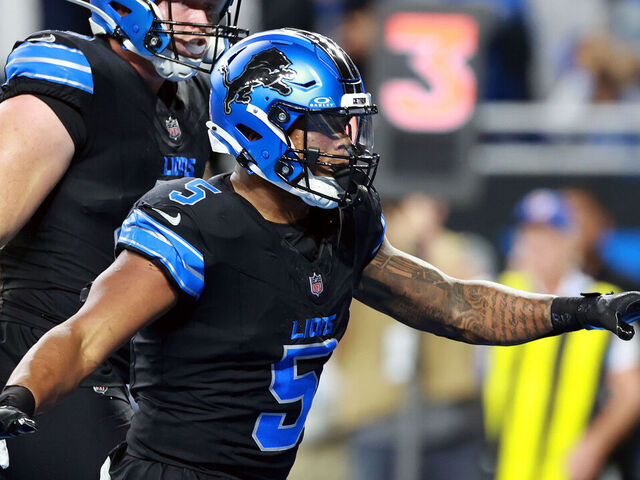 DETROIT, MICHIGAN-SEPTEMBER 30: Running back David Montgomery (5) of the Detroit Lions celebrates a Lions touchdown during a game between the Detroit Lions and the Seattle Seahawks in Detroit, Michigan USA, on Monday, September 30, 2024