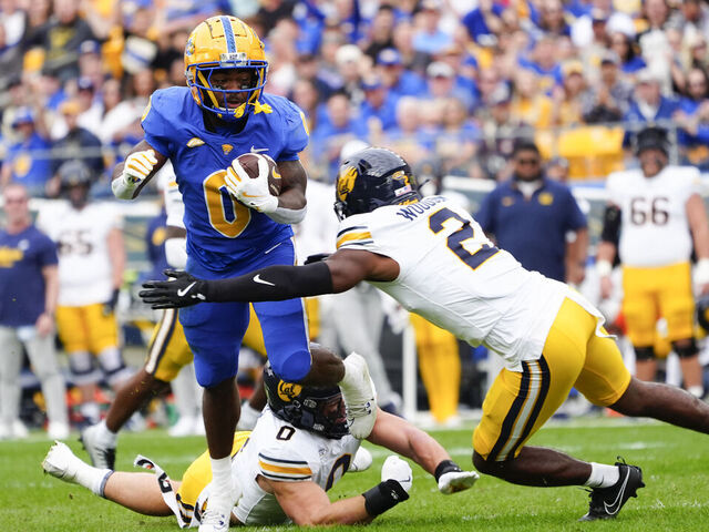 PITTSBURGH, PA - OCTOBER 12: California Golden Bears Defensive Back Craig Woodson (2) tackles Pittsburgh Panthers Running Back Desmond Reid (0) during the first half of the College Football game between the California Golden Bears and the Pittsburgh Panthers on October 12, 2024, at Acrisure Stadium in Pittsburgh, PA.