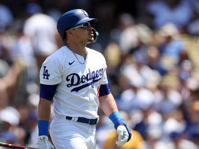 LOS ANGELES, CALIFORNIA - AUGUST 25: Enrique Hernández #8 of the Los Angeles Dodgers reacts after striking out during the third inning against the Tampa Bay Rays at Dodger Stadium on August 25, 2024 in Los Angeles, California.