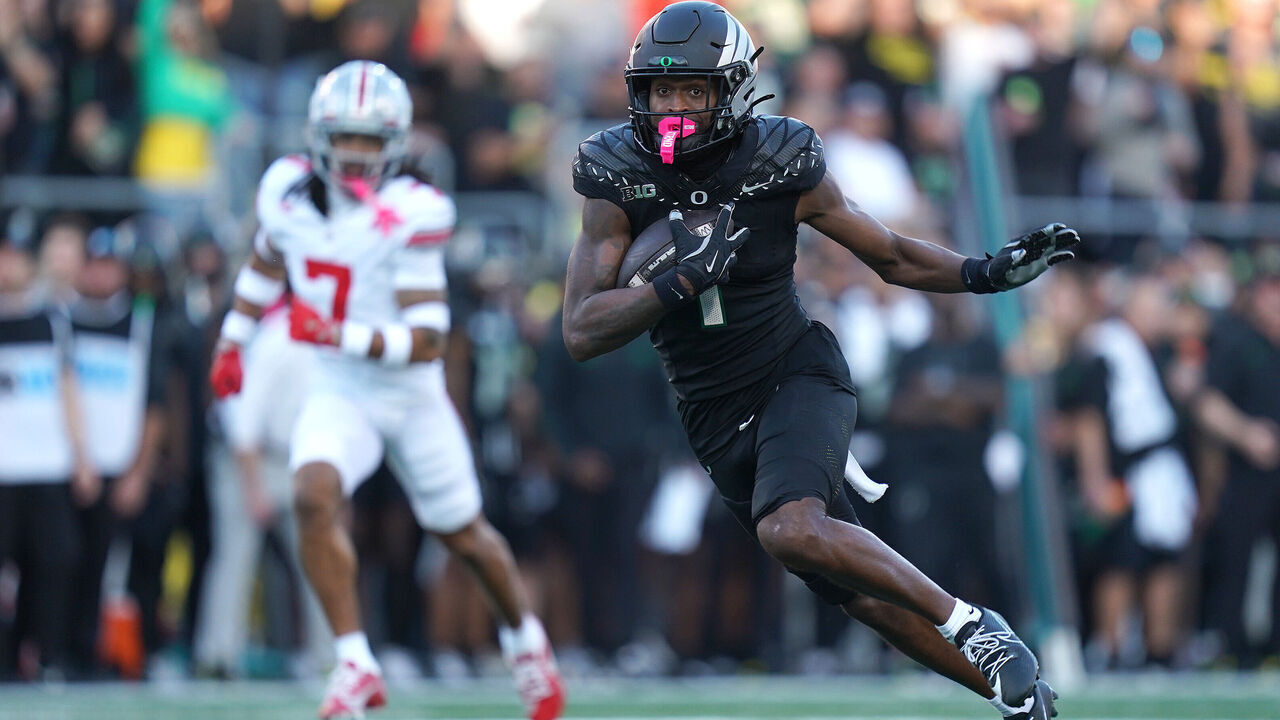 EUGENE, OREGON - OCTOBER 12: Traeshon Holden #1 of the Oregon Ducks runs the ball after a catch during the second quarter against the Ohio State Buckeyes at Autzen Stadium on October 12, 2024 in Eugene, Oregon.