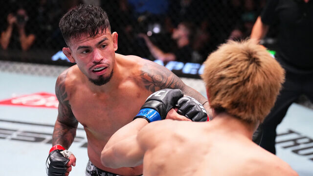 LAS VEGAS, NEVADA - OCTOBER 12: (L-R) Brandon Royval punches Tatsuro Taira of Japan in a flyweight fight during the UFC Fight Night event at UFC APEX on October 12, 2024 in Las Vegas, Nevada.