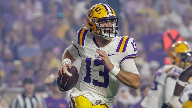 BATON ROUGE, LOUISIANA - OCTOBER 12: Garrett Nussmeier #13 of the LSU Tigers runs out of the pocket against the Ole Miss Rebels during the first half of a game at Tiger Stadium on October 12, 2024 in Baton Rouge, Louisiana.