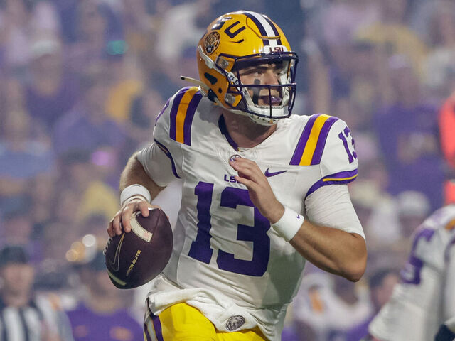 BATON ROUGE, LOUISIANA - OCTOBER 12: Garrett Nussmeier #13 of the LSU Tigers runs out of the pocket against the Ole Miss Rebels during the first half of a game at Tiger Stadium on October 12, 2024 in Baton Rouge, Louisiana.