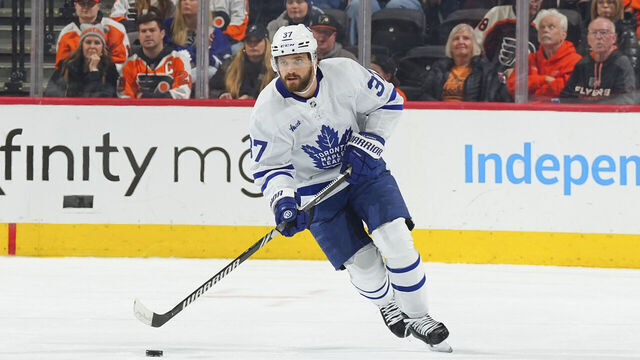 PHILADELPHIA, PENNSYLVANIA - MARCH 19: Timothy Liljegren #37 of the Toronto Maple Leafs controls the puck against the Philadelphia Flyers at the Wells Fargo Center on March 19, 2024 in Philadelphia, Pennsylvania. The Flyers defeated the Maple Leafs 4-3.