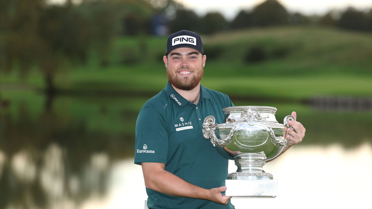 GUYANCOURT, FRANCE - OCTOBER 13: Dan Bradbury of England poses with the trophy after winning the FedEx Open de France 2024 at Le Golf National on October 13, 2024 in Guyancourt, France.