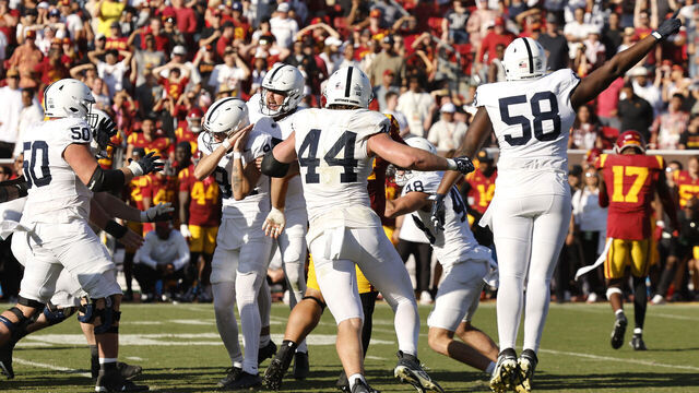 LOS ANGELES, CALIFORNIA - OCTOBER 12: Ryan Barker #94 of the Penn State Nittany Lions celebrates with teammates after kicking a field goal to defeat the USC Trojans 33-30 in overtime at United Airlines Field at the Los Angeles Memorial Coliseum on October 12, 2024 in Los Angeles, California.
