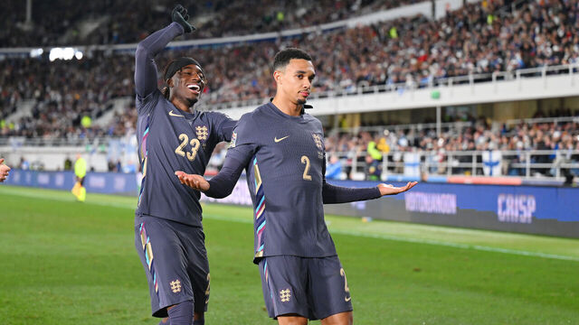 HELSINKI, FINLAND - OCTOBER 13: Trent Alexander-Arnold of England celebrates scoring his team's second goal with teammate Noni Madueke during the UEFA Nations League 2024/25 League B Group B2 match between Finland and England at Helsinki Olympic Stadium on October 13, 2024 in Helsinki, Finland.
