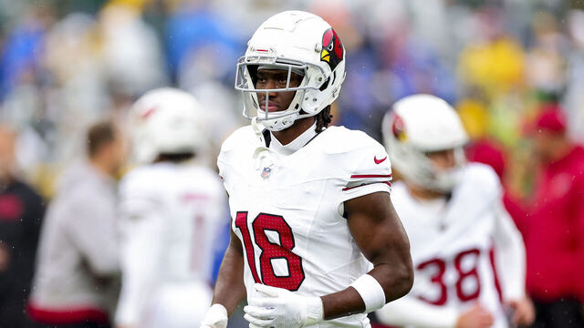 GREEN BAY, WISCONSIN - OCTOBER 13: Marvin Harrison Jr. #18 of the Arizona Cardinals warms up prior to playing the Green Bay Packers at Lambeau Field on October 13, 2024 in Green Bay, Wisconsin.