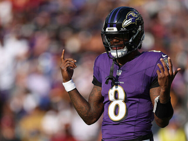 BALTIMORE, MARYLAND - OCTOBER 13: Lamar Jackson #8 of the Baltimore Ravens looks on against the Washington Commanders during the fourth quarter at M&T Bank Stadium on October 13, 2024 in Baltimore, Maryland.