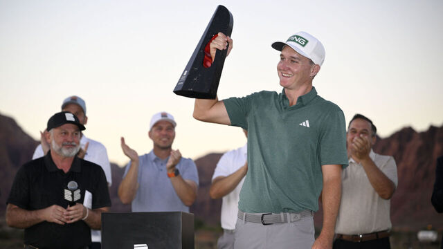 ST GEORGE, UTAH - OCTOBER 13: Matt McCarty of the United States celebrates with the trophy after winning the final round of the Black Desert Championship 2024 at Black Desert Resort on October 13, 2024 in St George, Utah.