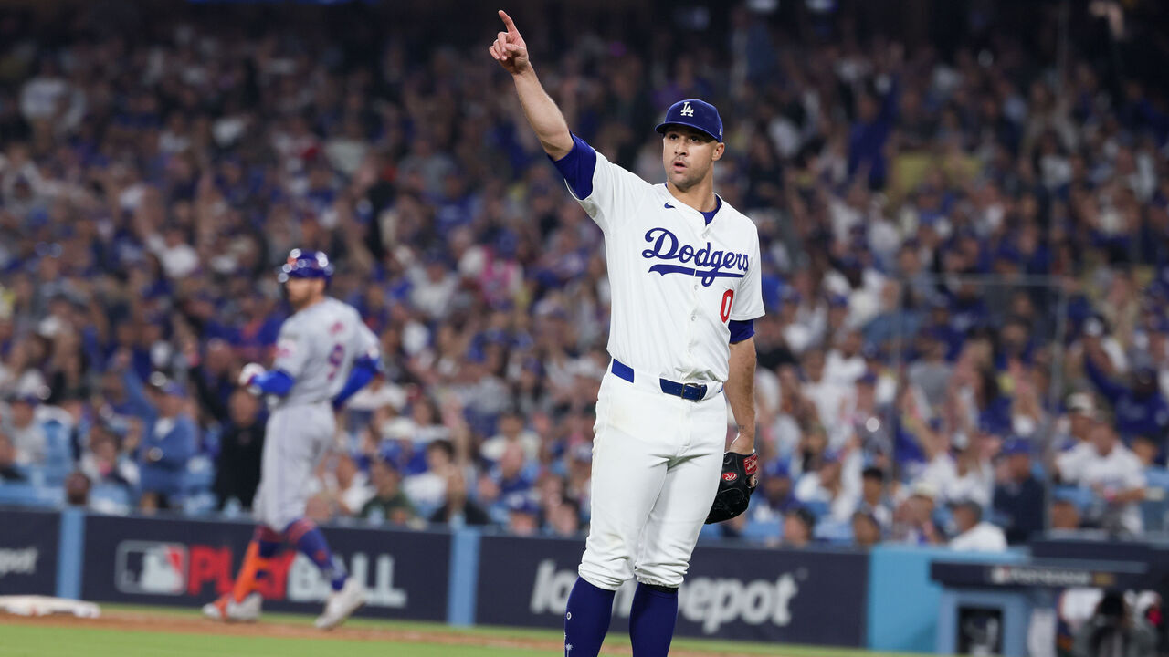 LOS ANGELES, CALIFORNIA - OCTOBER 13: Jack Flaherty #0 of the Los Angeles Dodgers points to Teoscar Hernández #37 after a foul ball hit by Brandon Nimmo #9 of the New York Mets during the sixth inning in game one of the National League Championship Series at Dodger Stadium on Sunday, Oct. 13, 2024 in Los Angeles. (Robert Gauthier / Los Angeles Times via Getty Images)