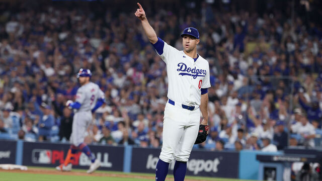 LOS ANGELES, CALIFORNIA - OCTOBER 13: Jack Flaherty #0 of the Los Angeles Dodgers points to Teoscar Hernández #37 after a foul ball hit by Brandon Nimmo #9 of the New York Mets during the sixth inning in game one of the National League Championship Series at Dodger Stadium on Sunday, Oct. 13, 2024 in Los Angeles. (Robert Gauthier / Los Angeles Times via Getty Images)