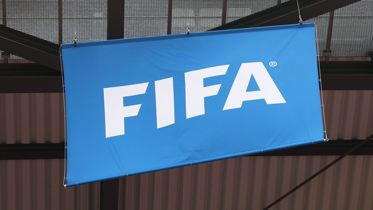 COLOGNE, GERMANY - JUNE 15: View a flag with the FIFA logo on during the UEFA EURO 2024 group stage match between Hungary and Switzerland at Cologne Stadium on June 15, 2024 in Cologne, Germany.