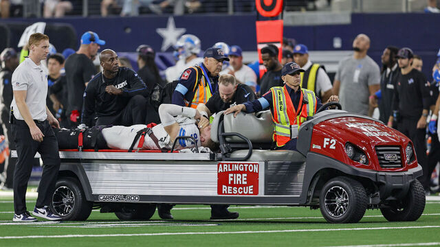 ARLINGTON, TX - OCTOBER 13: Detroit Lions defensive end Aidan Hutchinson (97) is carted of the field with an aircast on his left leg during the game between the Dallas Cowboys and the Detroit Lions on October 13, 2024 at AT&T Stadium in Arlington, Texas.