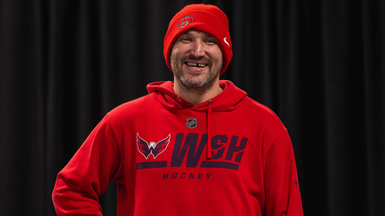 ELMONT, NEW YORK - DECEMBER 29: Alex Ovechkin #8 of the Washington Capitals smiles prior to the game against the New York Islanders at UBS Arena on December 29, 2023 in Elmont, New York.