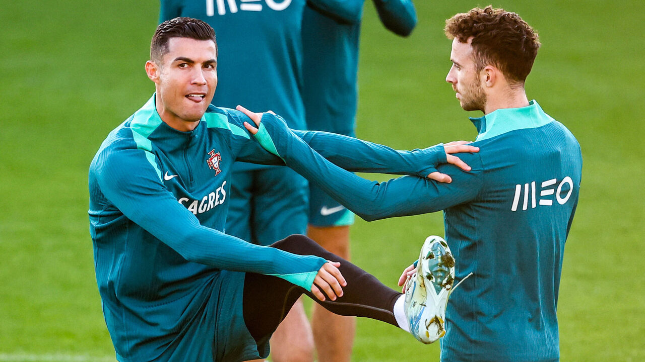 PAISLEY, SCOTLAND - OCTOBER 14: Portugal's Cristiano Ronaldo and Jota during a Portugal MD-1 training session at the SMiSA Stadium, on October 14, 2024, in Paisley, Scotland.