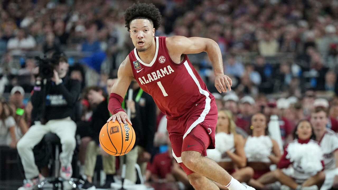 GLENDALE, ARIZONA - APRIL 06: Mark Sears #1 of the Alabama Crimson Tide dribbles up court during the NCAA Mens Basketball Tournament Final Four semifinal game agains The Connecticut Huskies at State Farm Stadium on April 06, 2024 in Glendale, Arizona.