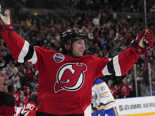 PRAGUE, CZECH REPUBLIC - OCTOBER 5: New Jersey Devils' Seamus Casey celebrates scoring a goal during the game between the New Jersey Devils and Buffalo Sabres during the 2024 NHL Global Series Czechia at O2 Arena on October 5, 2024 in Prague, Czech Republic.