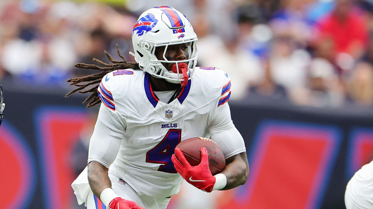 HOUSTON, TEXAS - OCTOBER 06: James Cook #4 of the Buffalo Bills carries against the Houston Texans during the first half at NRG Stadium on October 06, 2024 in Houston, Texas.