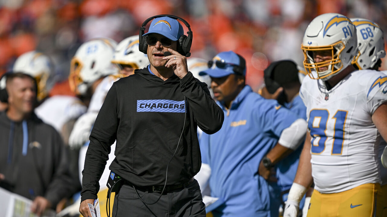 DENVER, CO - OCTOBER 13: Los Angeles Chargers head coach Jim Harbaugh works the game during the second quarter against the Denver Broncos at Empower Field at Mile High in Denver on Sunday, October 13, 2024.
