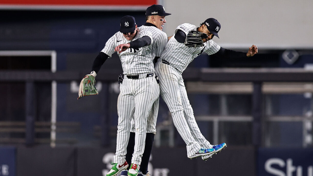 NEW YORK, NY - OCTOBER 14: Alex Verdugo #24, Aaron Judge #99 and Juan Soto #22 of the New York Yankees celebrate after winning Game 1 of the ALCS presented by loanDepot between the Cleveland Guardians and the New York Yankees at Yankee Stadium on Monday, October 14, 2024 in New York, New York. The New York Yankees won 5-2.