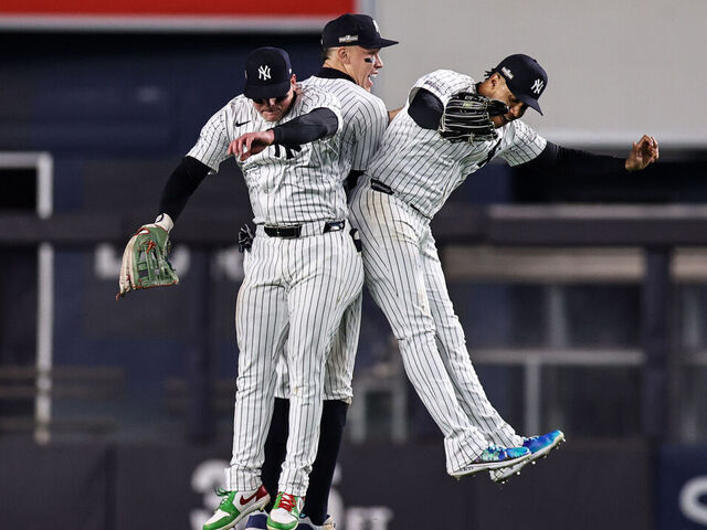 NEW YORK, NY - OCTOBER 14: Alex Verdugo #24, Aaron Judge #99 and Juan Soto #22 of the New York Yankees celebrate after winning Game 1 of the ALCS presented by loanDepot between the Cleveland Guardians and the New York Yankees at Yankee Stadium on Monday, October 14, 2024 in New York, New York. The New York Yankees won 5-2.